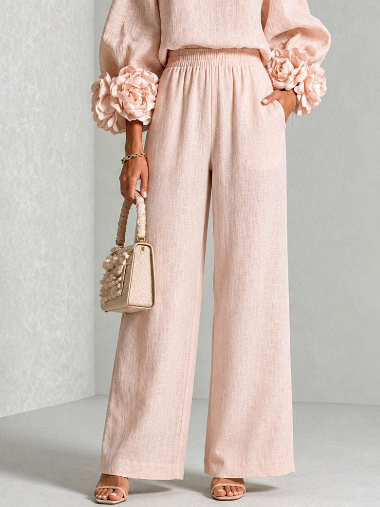 Ofelia | Conjunto con puños de flores y pantalón de pierna ancha